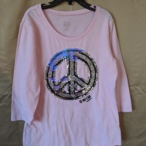 A flip sequence swim shirt